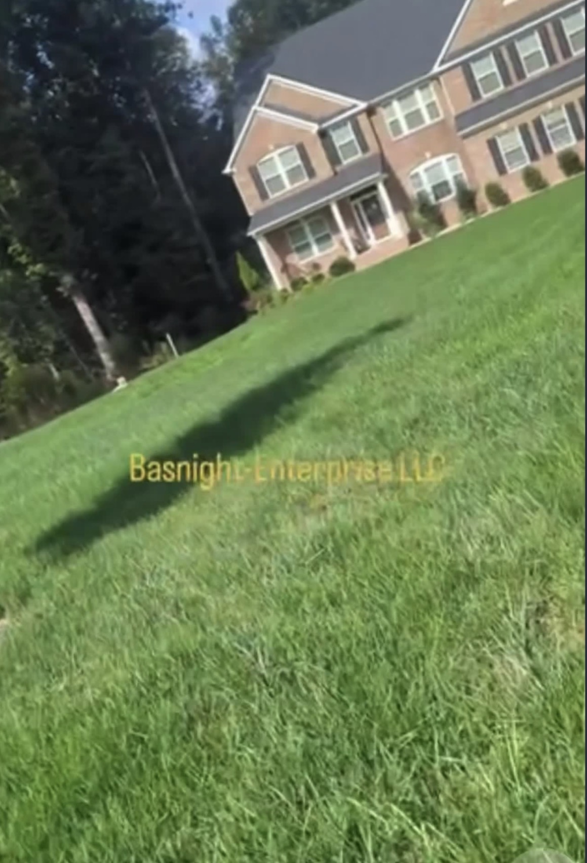 Lawn mowing service on a residential property in Chester, VA — Basnight Enterprises, LLC.